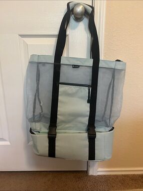 Fitfort Light Mint Mesh Tote with Black Straps and Front Pocket.